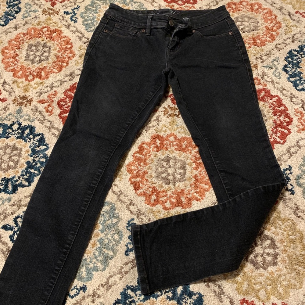 The Limited, plain black jeans, slightly worn, size 4